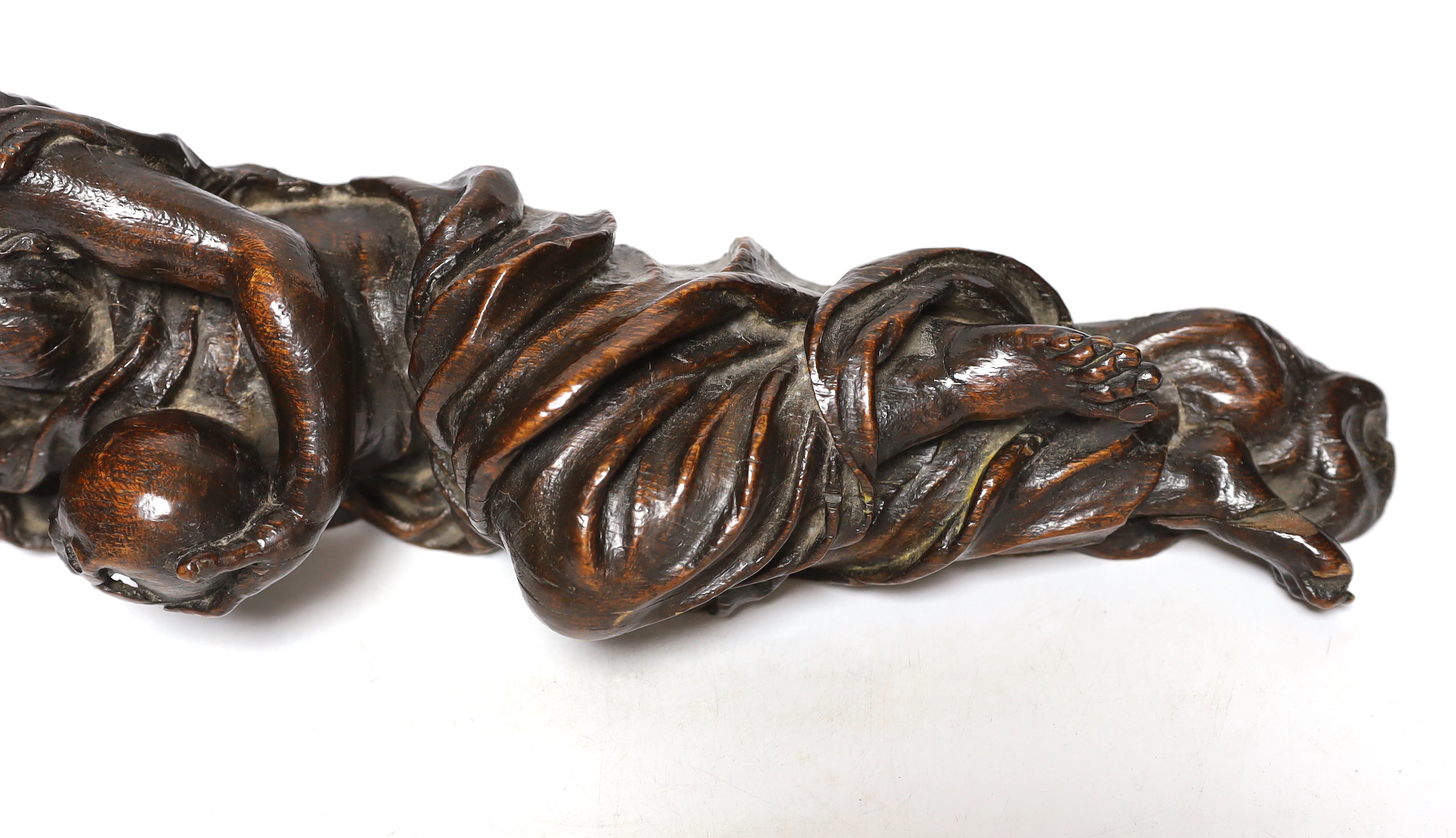 A 17th century carved oak figure of the penitent Mary Magdalene, possibly English, 52.5cm